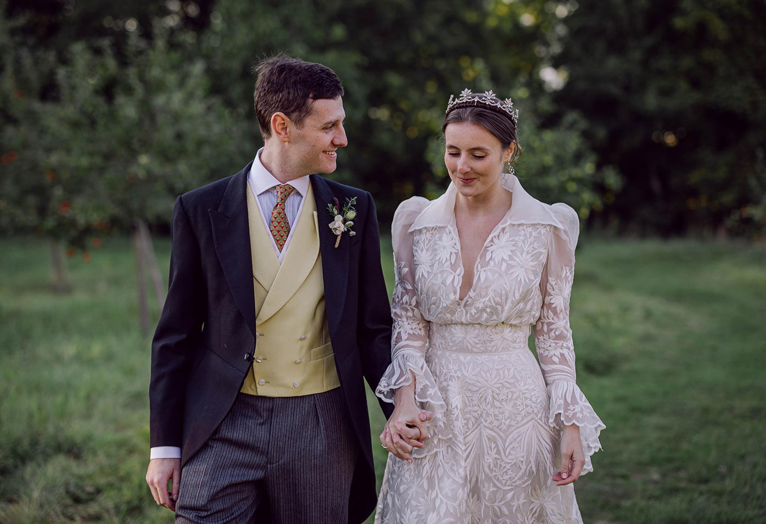 Sophie Coleridge and Lucien Ireland on their wedding day. Sophie wearing a Naeem Khan wedding dress